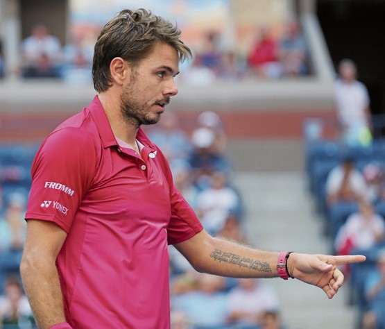 Stan Wawrinka mit dem Beckett-Zitat auf dem linken Unterarm: «Ever tried. Ever failed. No matter. Try again. Fail again. Fail better.»Bild: 123RF