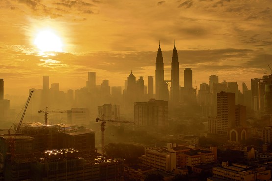Sonnenaufgang über der Silhouette von Kuala Lumpur City: Malaysia und die Schweiz setzen neu auf Freihandel. Bild: 123RF